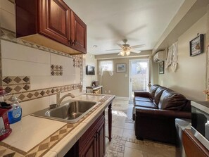 Fridge, microwave, coffee/tea maker, toaster