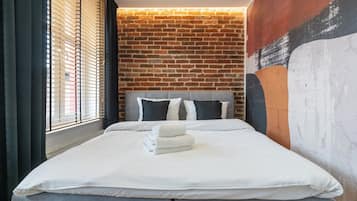 1 habitación, tabla de planchar con plancha, wifi y ropa de cama