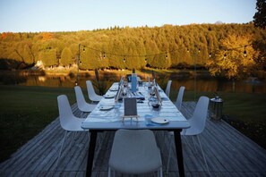 Outdoor dining - Exclusive 100-Acre Modern Estate Designed Home (Alton)