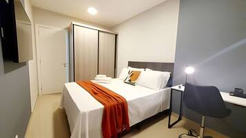 1 bedroom, desk, iron/ironing board, travel crib