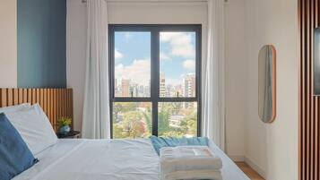 2 bedrooms, desk, iron/ironing board, travel crib