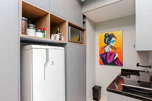 Fridge, microwave, stovetop, coffee/tea maker