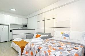 1 bedroom, desk, iron/ironing board, travel crib