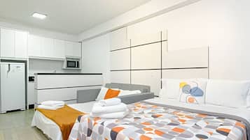 1 bedroom, desk, iron/ironing board, travel cot