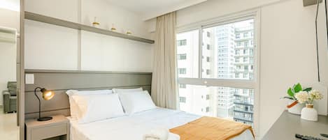 1 bedroom, desk, iron/ironing board, travel crib