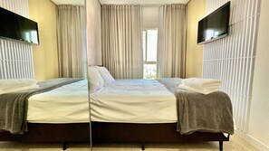 2 bedrooms, desk, iron/ironing board, travel cot