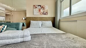 1 bedroom, desk, iron/ironing board, travel cot