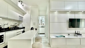 Fridge, microwave, stovetop, coffee/tea maker