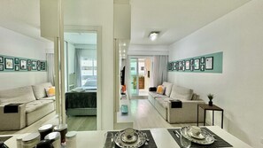 1 bedroom, desk, iron/ironing board, travel crib