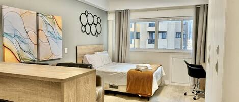 1 bedroom, desk, iron/ironing board, travel cot