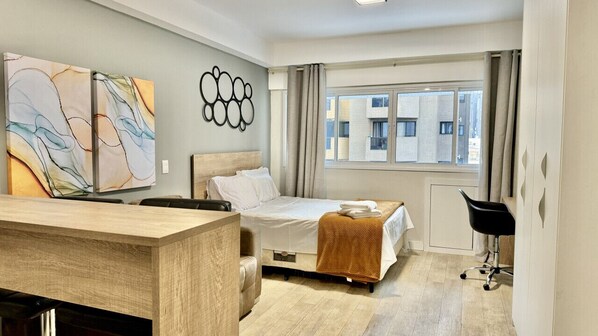 1 bedroom, desk, iron/ironing board, travel crib