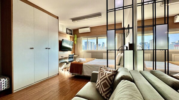 1 bedroom, desk, iron/ironing board, travel crib