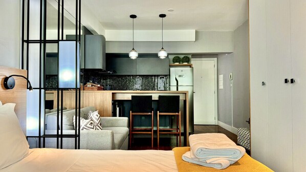 1 bedroom, desk, iron/ironing board, travel crib