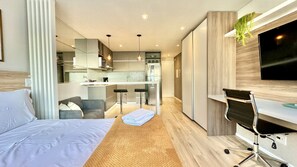 1 bedroom, desk, iron/ironing board, travel crib