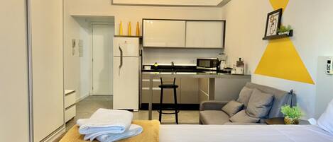 1 bedroom, desk, iron/ironing board, travel cot