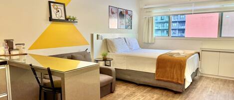 1 bedroom, desk, iron/ironing board, travel crib