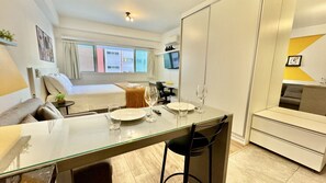 1 bedroom, desk, iron/ironing board, travel crib