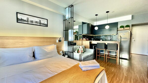 1 bedroom, desk, iron/ironing board, travel crib