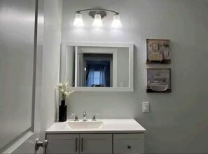 Shower, towels, toilet paper