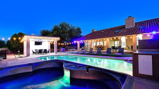 A swimming pool area with a hot tub, lounge chairs, and a covered seating area. - ScottsdaleStays 10BR-6BA Multimillion Acre Estate-Pool-SportCourts-SPECIAL DEALS (Phoenix)