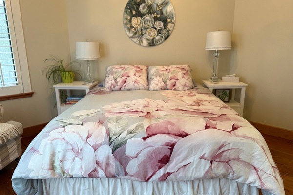 This bedroom exudes warmth and elegance with its soft neutral colors and decor.