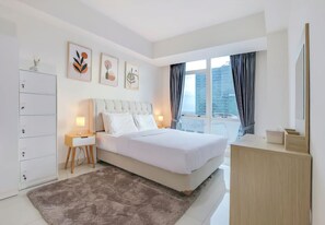 Deluxe Apartment, 2 Bedrooms, Balcony, City View | Minibar, blackout drapes, soundproofing, free WiFi - Staycation Jakarta Kensington Royal (Jakarta)
