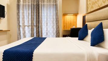 Deluxe Room | Desk, laptop workspace, free WiFi, bed sheets