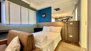 1 bedroom, desk, iron/ironing board, travel cot