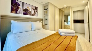 2 bedrooms, desk, iron/ironing board, travel crib