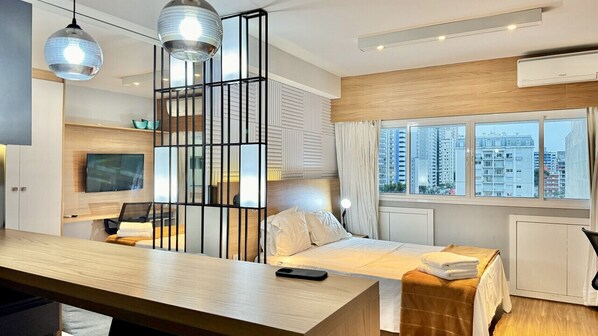 1 bedroom, desk, iron/ironing board, travel crib