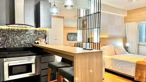 Fridge, microwave, stovetop, coffee/tea maker