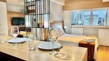 1 bedroom, desk, iron/ironing board, travel crib