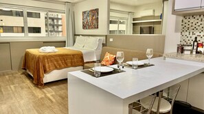 1 bedroom, desk, iron/ironing board, travel crib