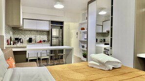 1 bedroom, desk, iron/ironing board, travel cot