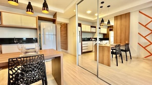 Fridge, microwave, stovetop, coffee/tea maker