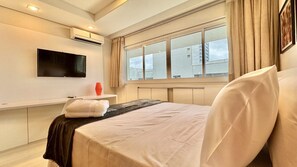 1 bedroom, desk, iron/ironing board, travel crib