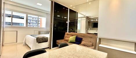 1 bedroom, desk, iron/ironing board, travel crib