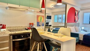 Fridge, microwave, stovetop, coffee/tea maker