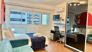 1 bedroom, desk, iron/ironing board, travel crib