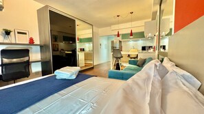 1 bedroom, desk, iron/ironing board, travel crib