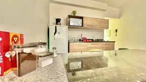 Fridge, microwave, stovetop, coffee/tea maker