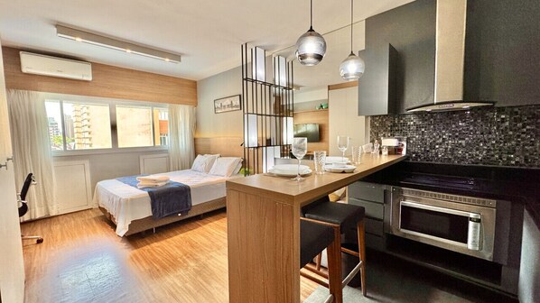 1 bedroom, desk, iron/ironing board, travel crib