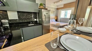 1 bedroom, desk, iron/ironing board, travel crib