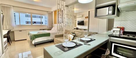 1 bedroom, desk, iron/ironing board, travel crib