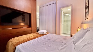 1 bedroom, desk, iron/ironing board, travel cot