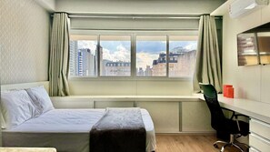 1 bedroom, desk, iron/ironing board, travel cot