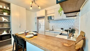 Fridge, microwave, stovetop, coffee/tea maker