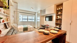 1 bedroom, desk, iron/ironing board, travel crib