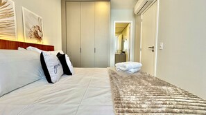 1 bedroom, desk, iron/ironing board, travel crib