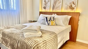 1 bedroom, desk, iron/ironing board, travel crib